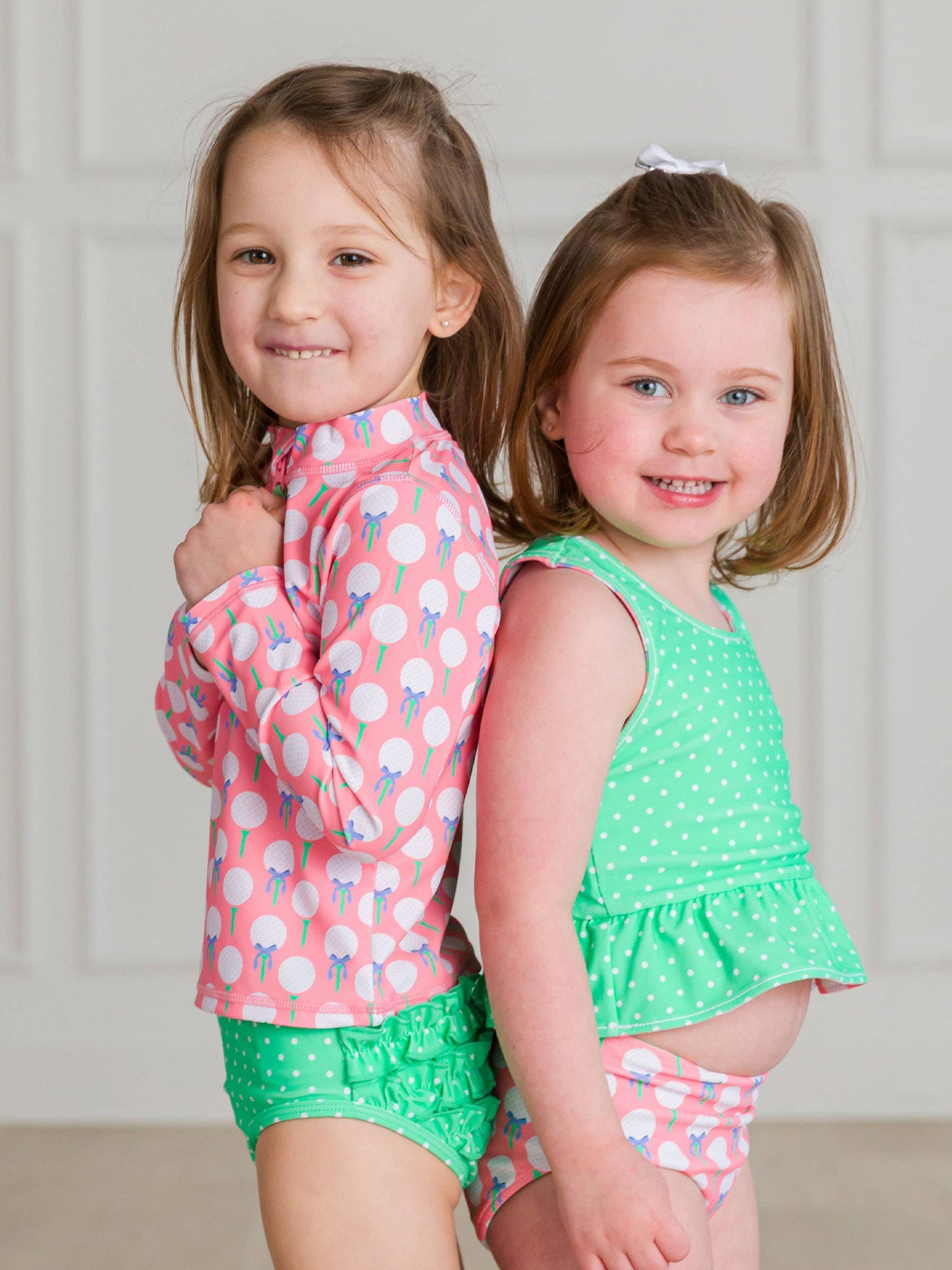 Girls Pink Tee Time Long Sleeve Zipper Rash Guard 2-Piece Swimsuit with Signature Rear Ruffles