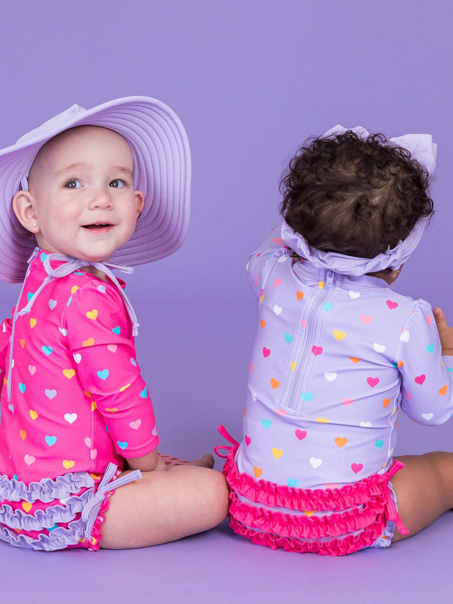 Baby Girls Colorful Hearts Long Sleeve One Piece Rash Guard Swimsuit with Signature Rear Ruffles