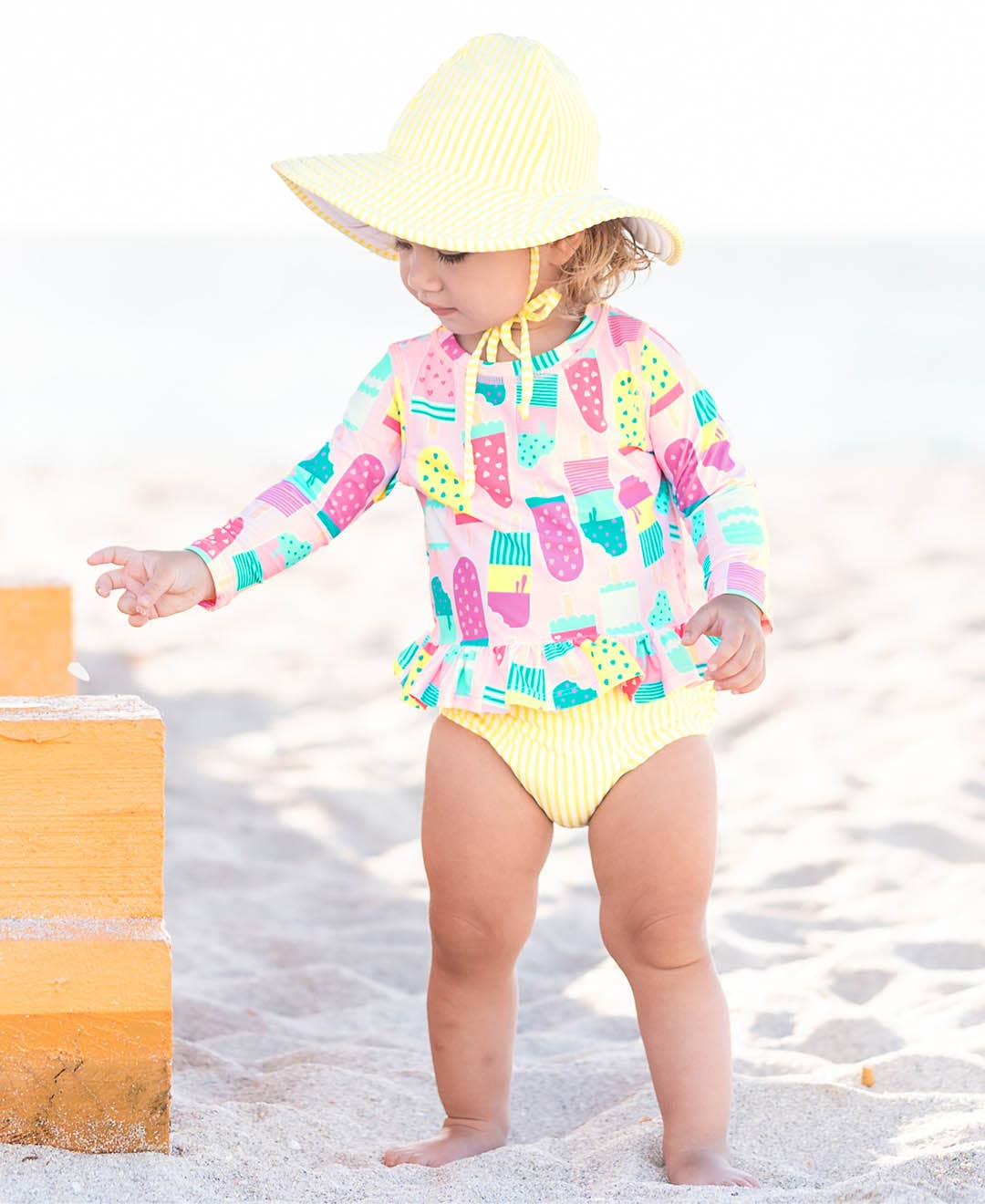 Girls Ice Cream Social Long Sleeve Ruffle Hem Rash Guard 2-Piece Swimsuit with Signature Rear Ruffles