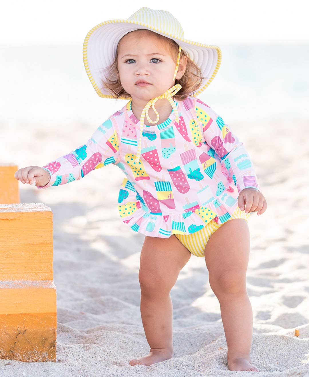 Girls Ice Cream Social Long Sleeve Ruffle Hem Rash Guard 2-Piece Swimsuit with Signature Rear Ruffles