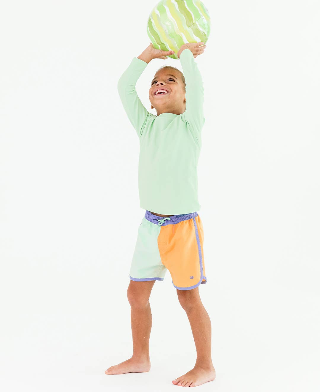 Boys Periwinkle, Frost Green, and Ginger Color Block Dolphin Hem Swim Trunks