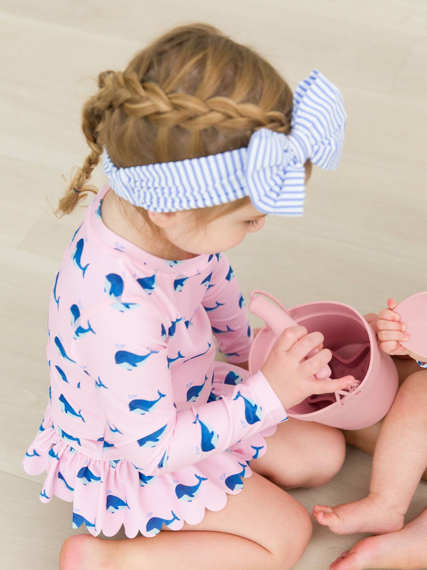 Girls Pink Whale Friends Scallop Hem Long Sleeve Rash Guard 2-Piece Swimsuit with Signature Rear Ruffles