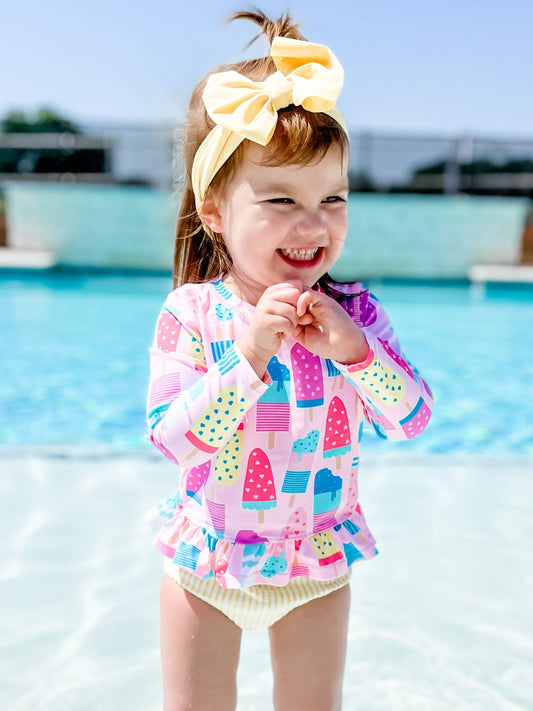 Girls Ice Cream Social Long Sleeve Ruffle Hem Rash Guard 2-Piece Swimsuit with Signature Rear Ruffles